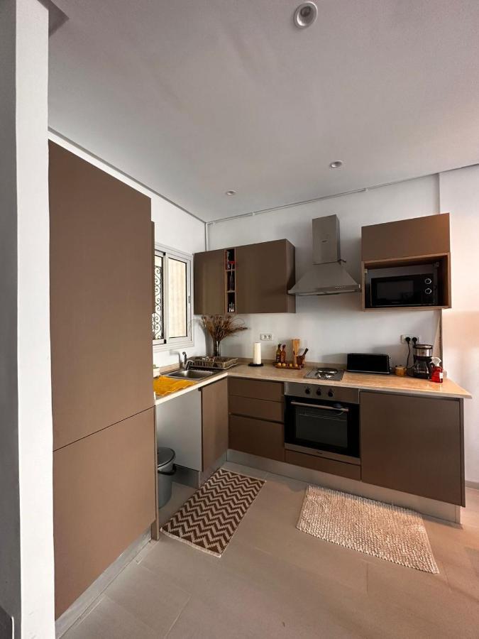 App Avec Jardin Dans Un Hotel قمرت المظهر الخارجي الصورة